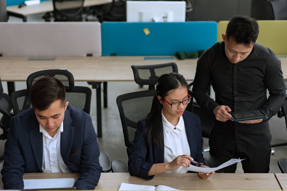 Interns working together in an office